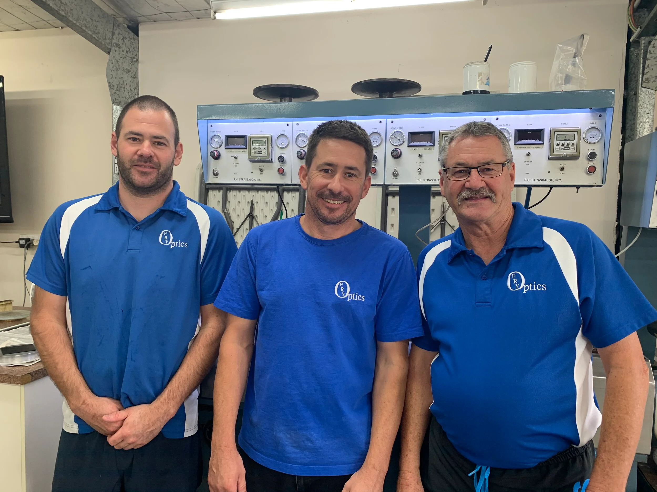 Fry Optics team members group photo