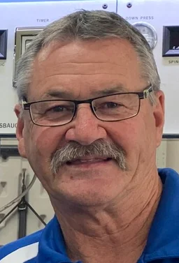 Portrait of Alan Fry, founder of Fry Optics